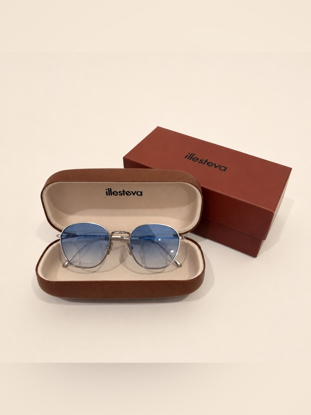 Illesteva Silver Frame Sunglasses with Blue Gradient Lenses